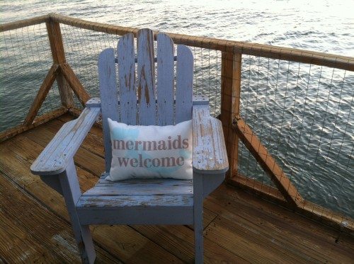 Mermaids Welcome Pillow in a beach chair