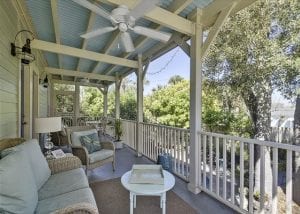 the glorious porch of whispering palms cottage