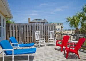 rocking chairs on deck at atlantic 1 cottage mermaid cottages tybee island ga