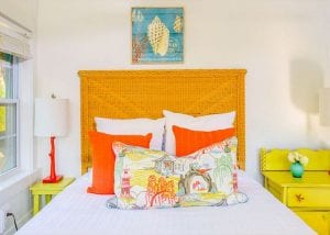 we love bursts of orange in the bedroom