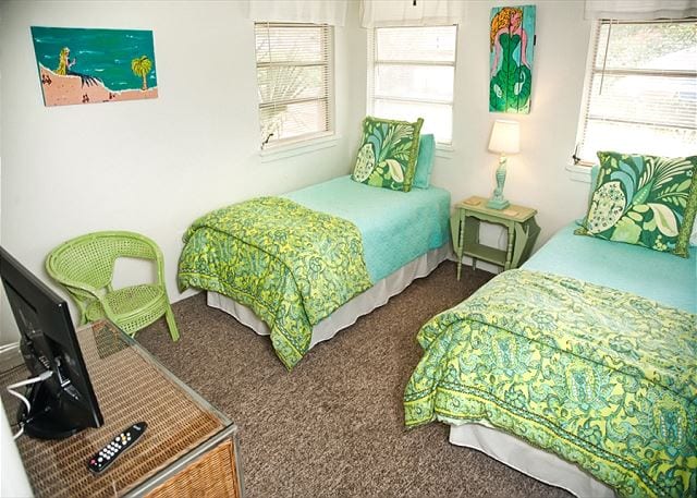 twin beds in green at canty's cottage