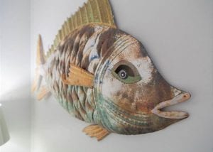 screened inn fish art mermaid cottages